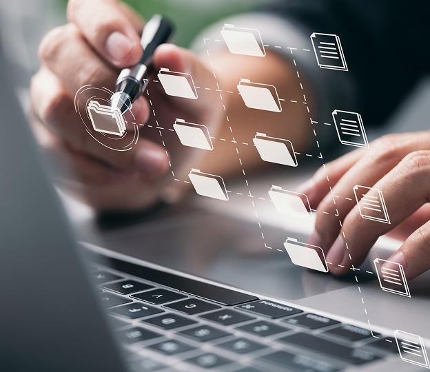 Close up of hands at a laptop